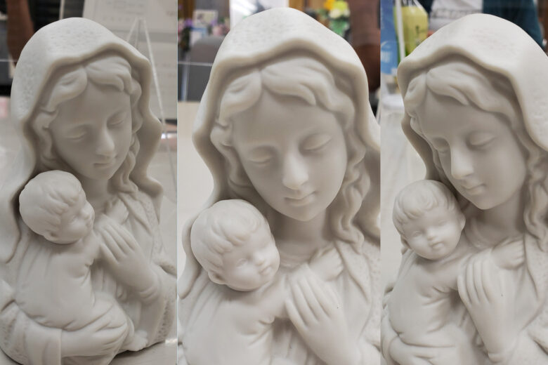 墓石に彫刻する「聖母マリア」の置物